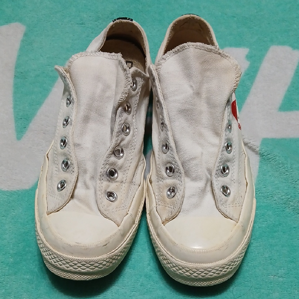Converse White Sneakers with Red Heart Detail